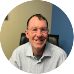 KC Hunt, sitting at his desk, eager to do great work for Dancor Solutions